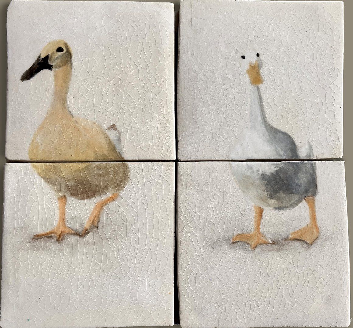 Hand painted feature tiles of a goose and a duck