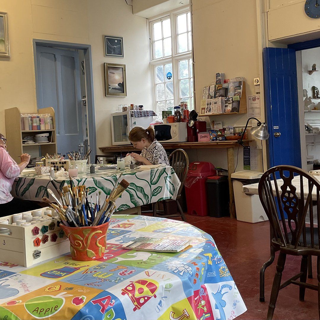 pottery painting in the studio at Gabrielle's Gallery