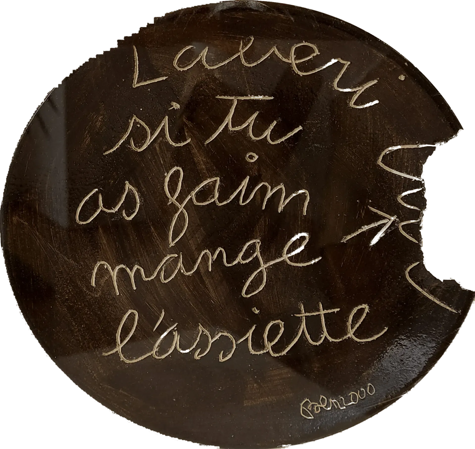 Scritta in francese su un piatto.