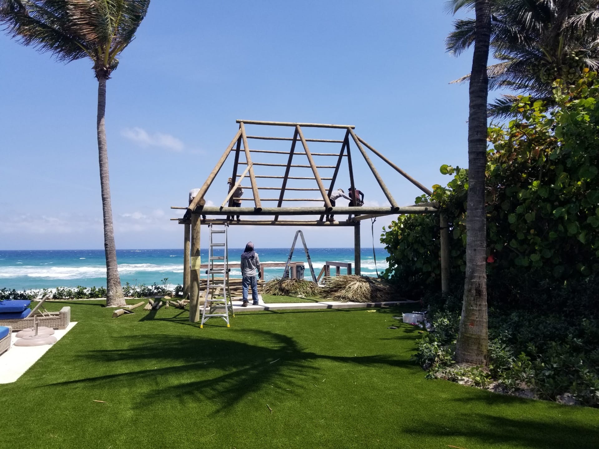Outdoor-Kitchen-Tiki-Hut-With-Chandelier