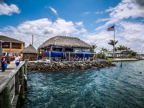 Waters-Edge-Two-Story-Tiki-Roof-FtPierce