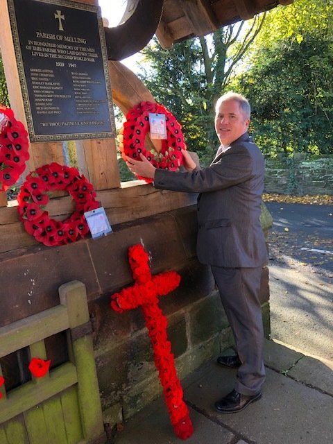 Councillor Alan Todd laying wreath