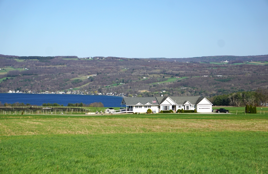 Azure Hill Winery blue lake and building.