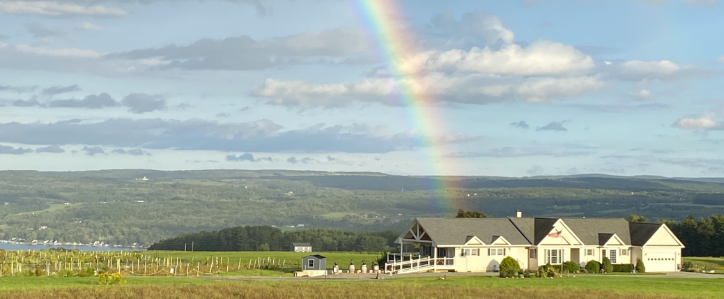 Rainbow directly on Azure Hill Winery's tasting room