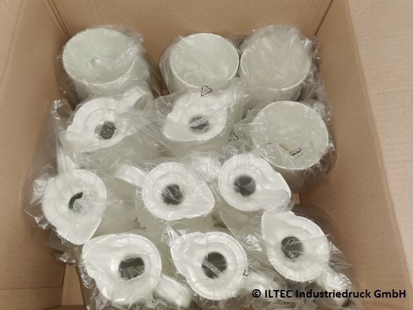 Runddruck, Siebdruck, auf konkaven Produkten. Druckerei in Stuttgart für Industriedruck, Tampondruck und Siebdruck