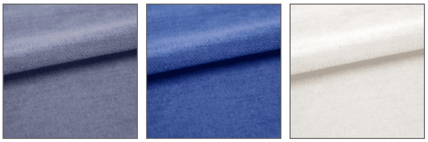 Échantillon de tissu Amara bleu roi entouré de teintes gris perle et blanc cassé.