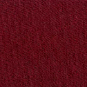 Tissu d'ameublement Kyrios rouge corail, texture tissée serrée offrant un aspect naturel et moderne.