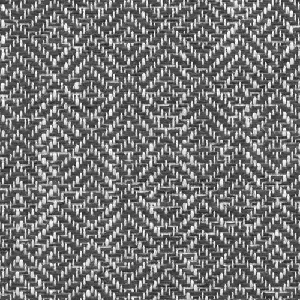 Zoom sur le tissu Quito noir et blanc avec un motif de tissage en chevrons serré et contrasté.