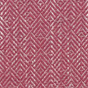 Zoom sur le tissu Quito rose fuchsia avec un motif géométrique de chevrons tissés en relief.