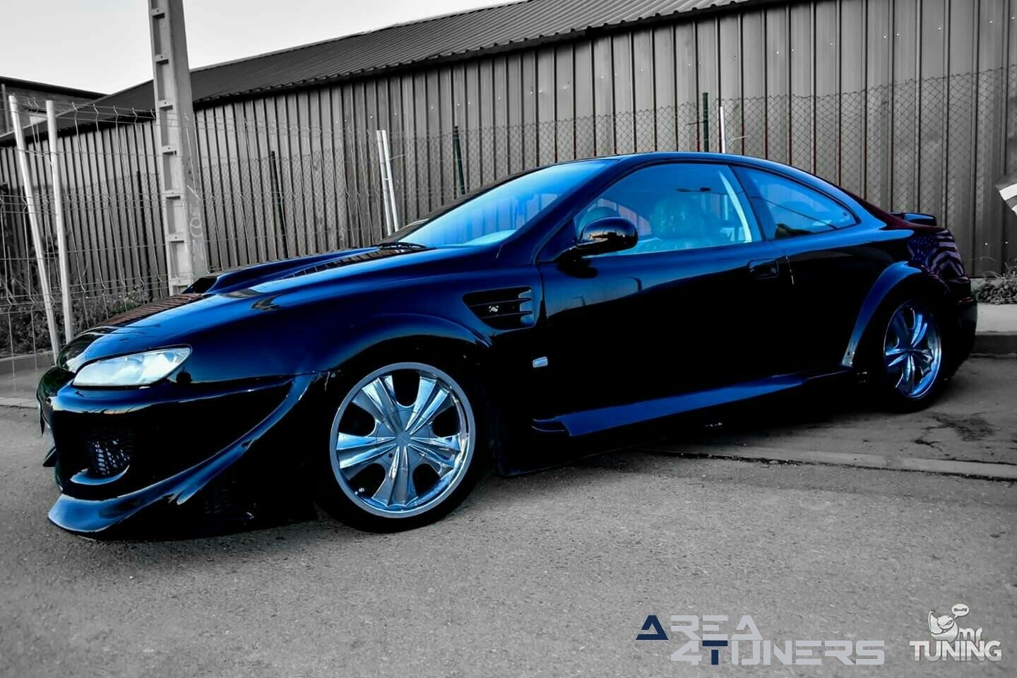 Tuning Show Mr Dance Club
Imagen del reportaje revista Tuning Area4tuners.es, concentración de coches Tuning del año 2019 en Monreal del Campo, Teruel, España