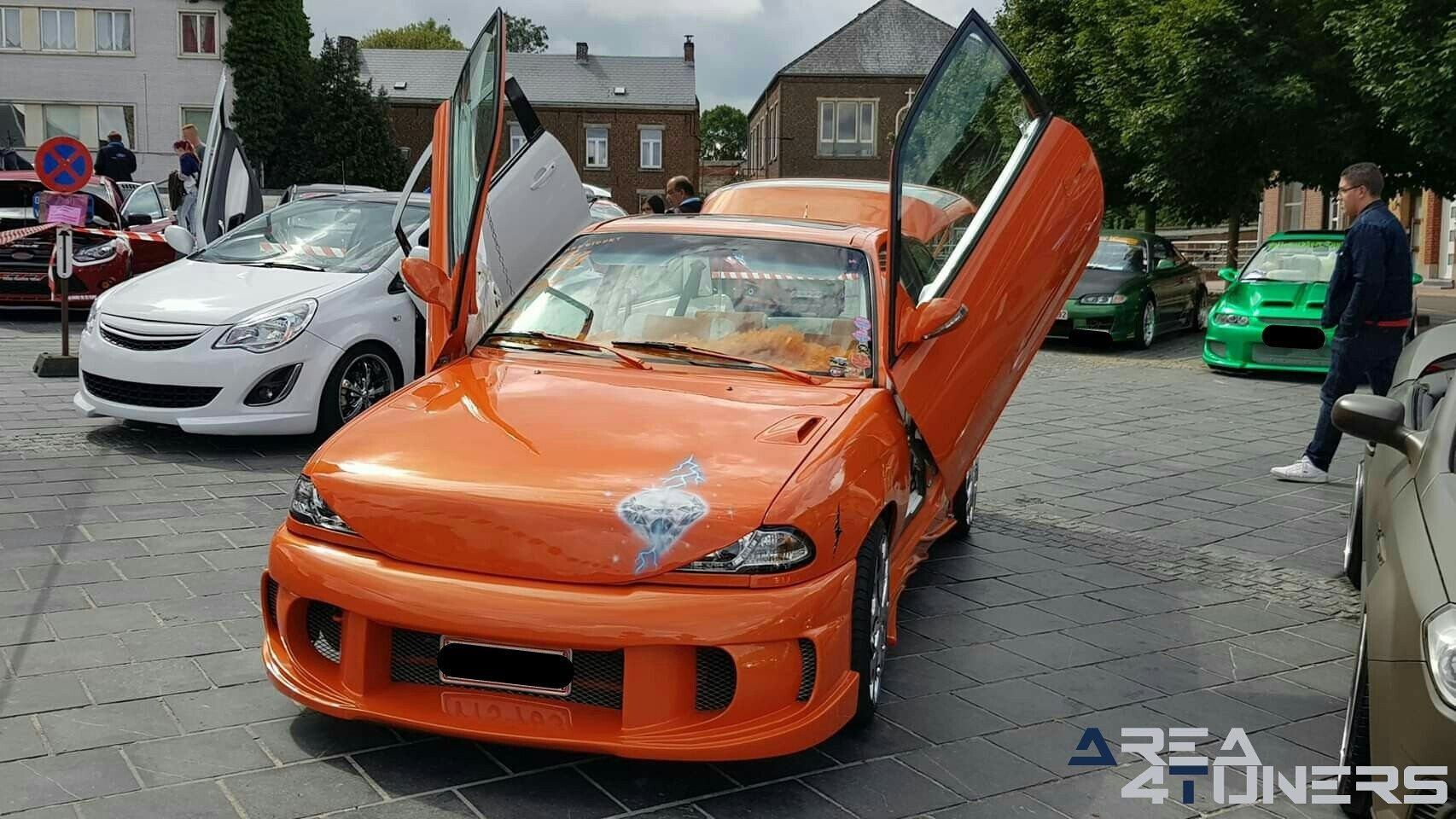 9eme Tuning Car 2019
Imagen del reportaje de la revista Tuning Area4tuners.es, de la
concentración de coches Tuning del año 2019 en Anderlues Bélgica