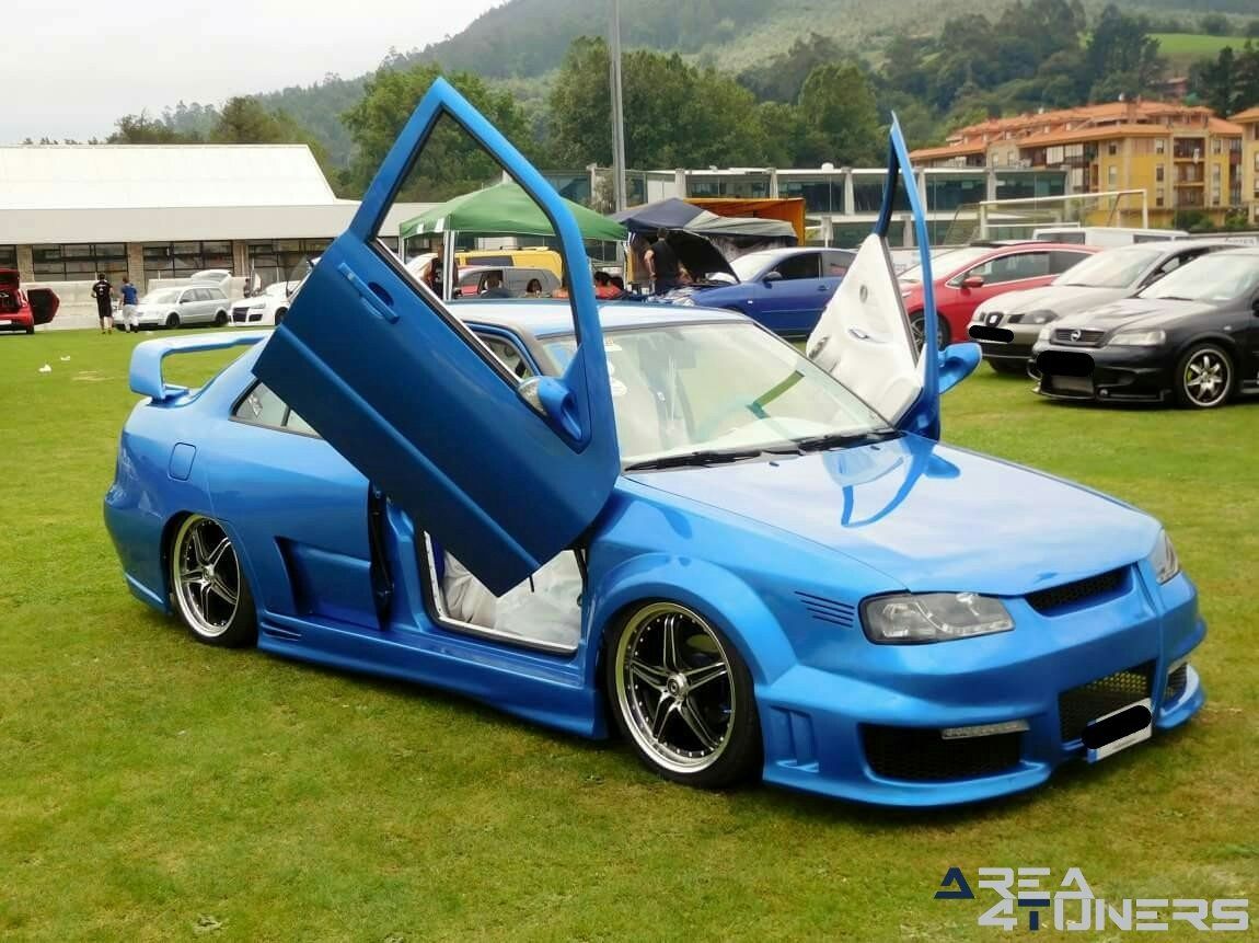 2ª Concetración Crazy Tuning
Imagen del reportaje revista Tuning Area4tuners.es, concentración de coches Tuning del año 2018 en Sarón, Cantabria, España
