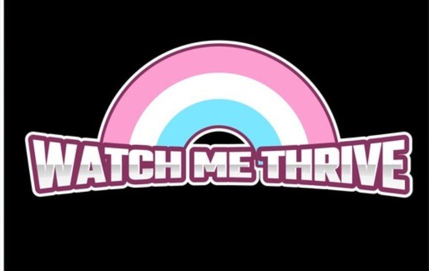 A pink, white and blue rainbow with the text