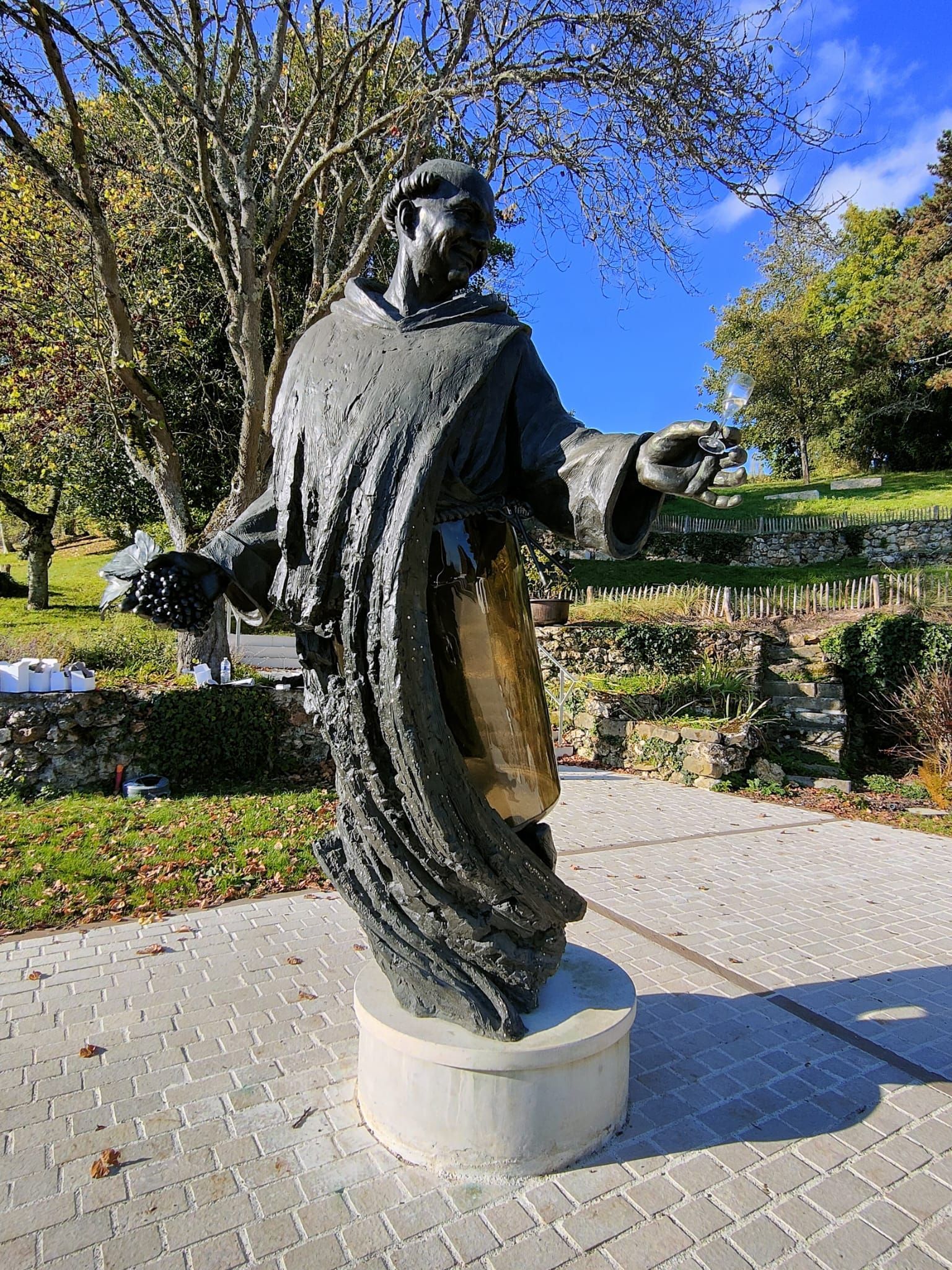 Dom Pérignon statue in Hautvillers overlooking Champagne vineyards
