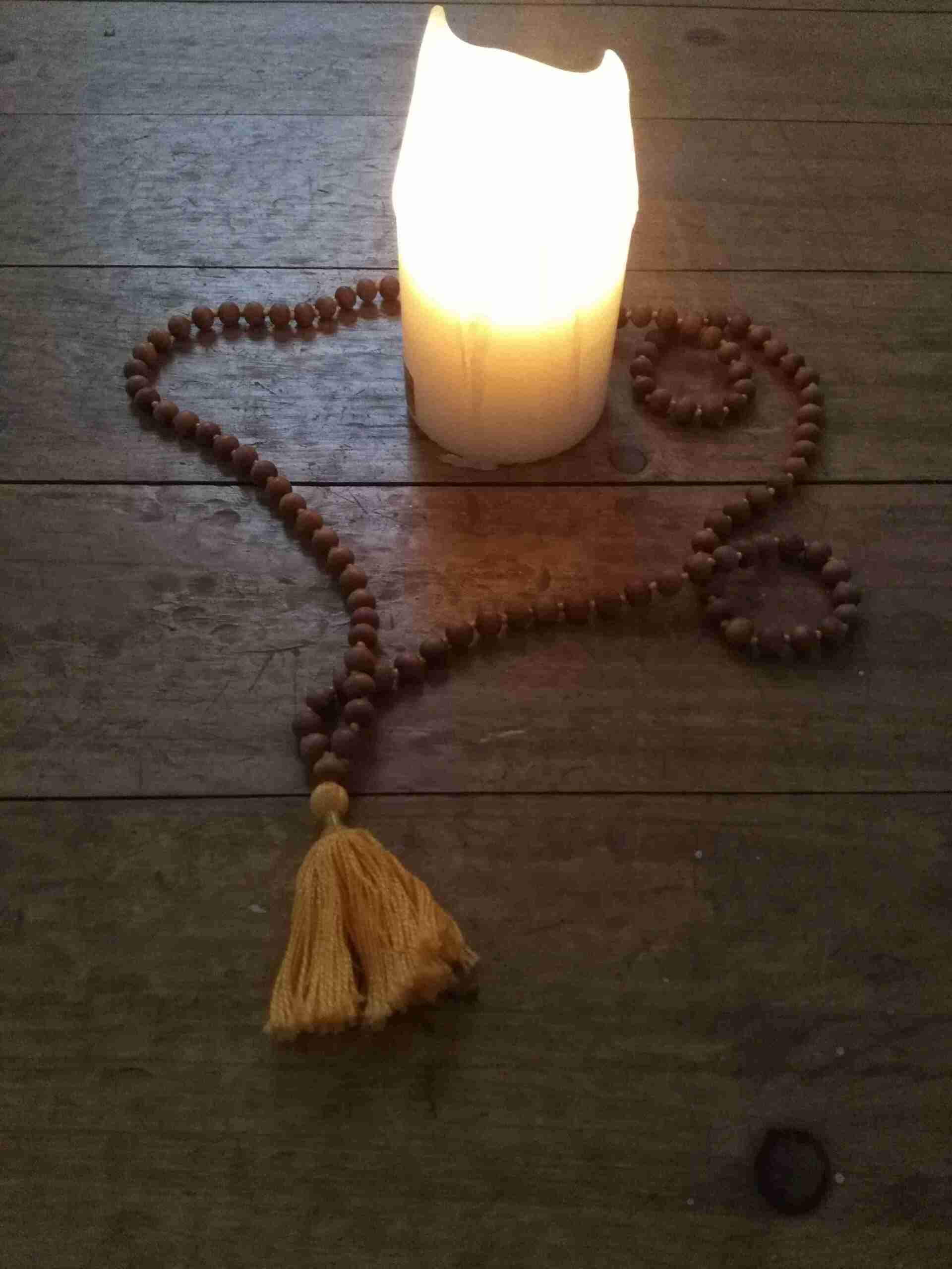 Kerze mit Mala