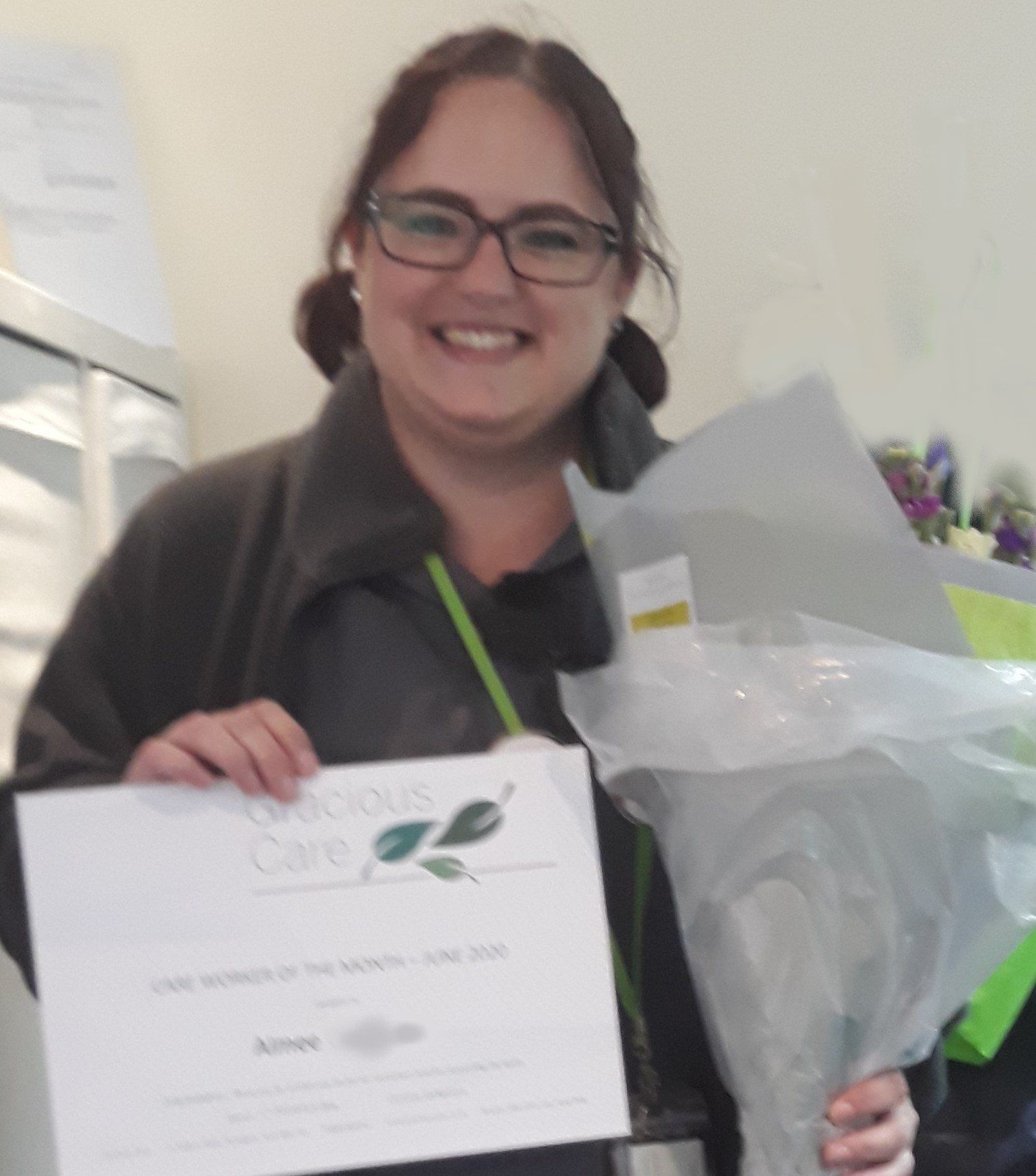 Aimee with her certificate