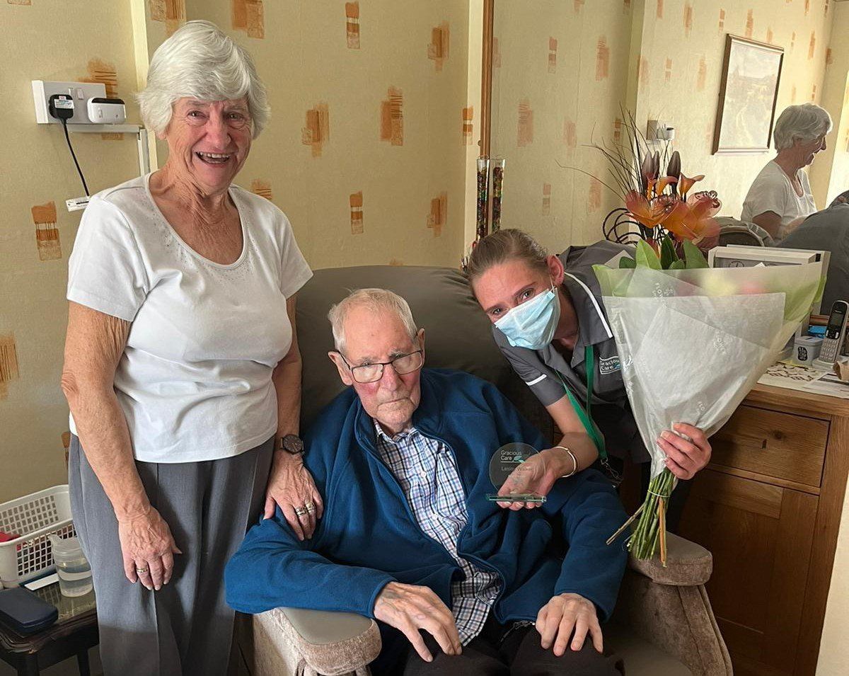 Customer presents Carer of the Year 2022 award