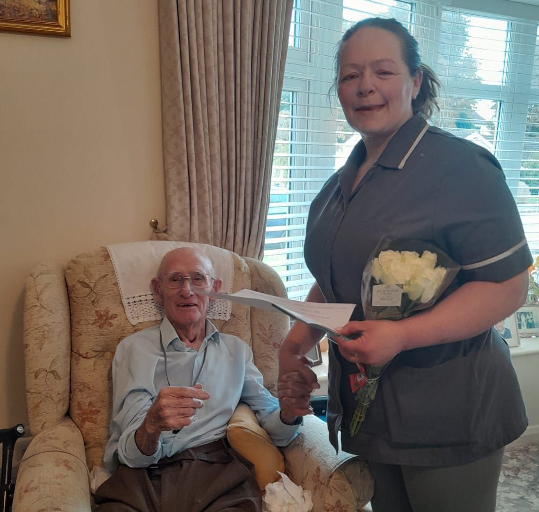 Carer presented by a customer with her 2024 End of Life Carer award