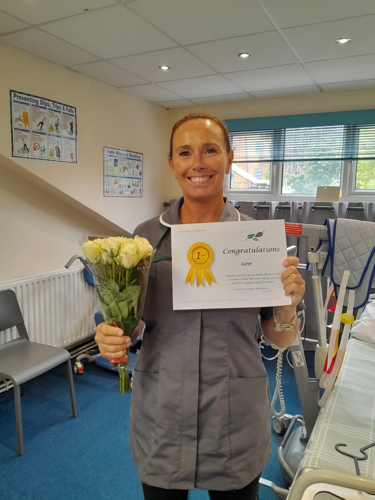 Carer presented with her 1st year certificate