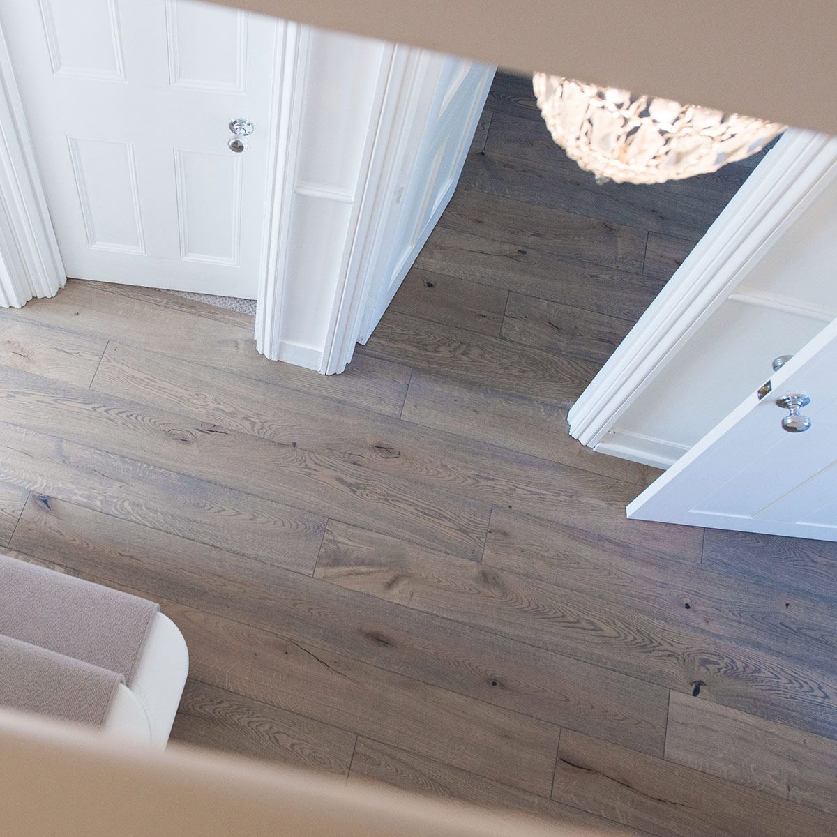 grey brown laminate flooring in a hall way