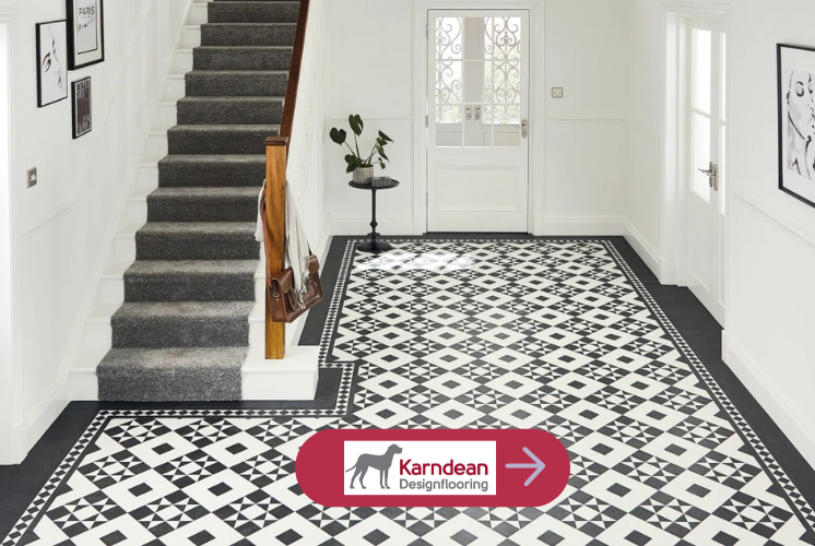 Black and white tiled hallway in Karndean's heritage range, white staircase with grey carpet