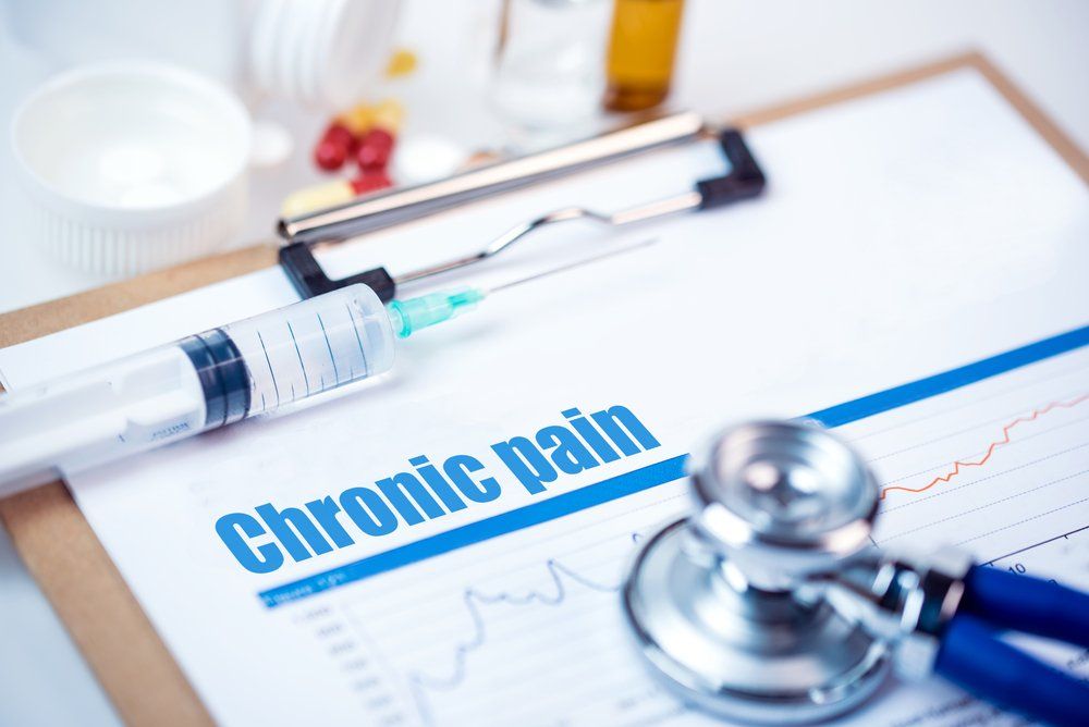 chronic pain chart and stethoscope