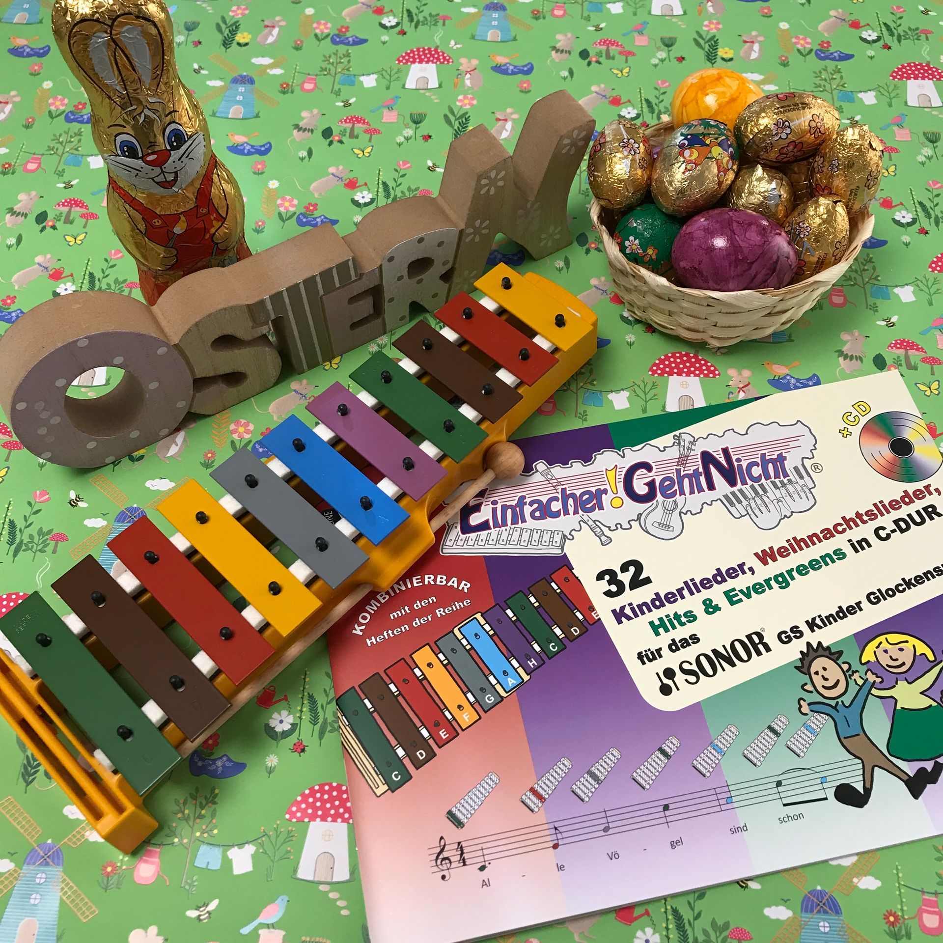 Geschenke zu Ostern | Glockenspiel mit bunten Noten für Kinderlieder, Weihnachtslieder und Hits und Evergreens
