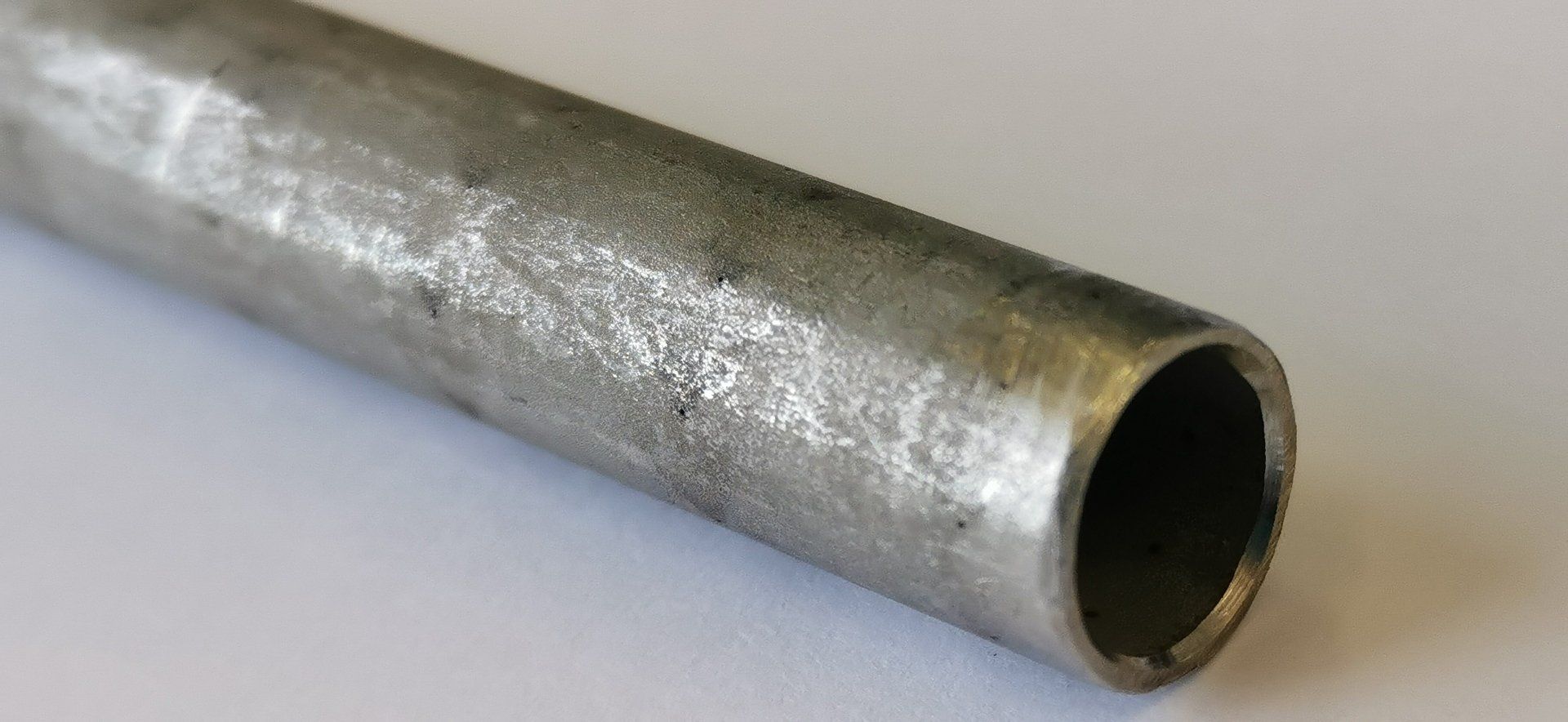 Laser micro drillings on the circumference of a tube