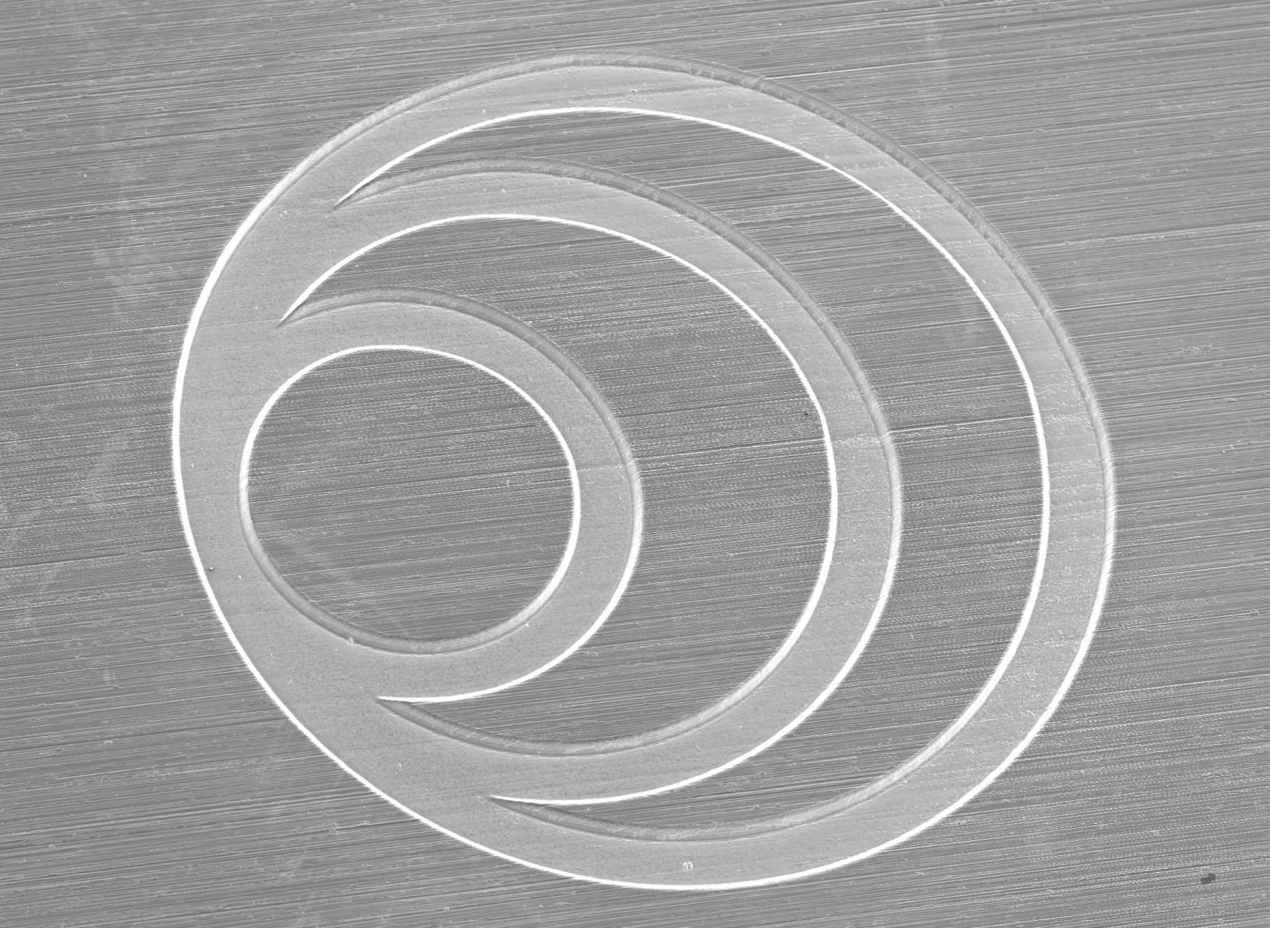 Micro engraving on a steel surface