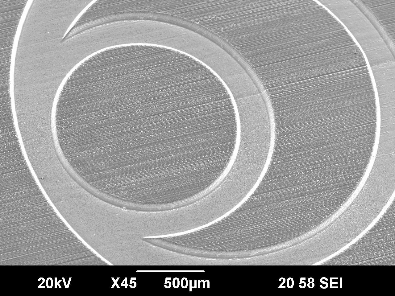 Detailed view of a micro engraving on a steel surface