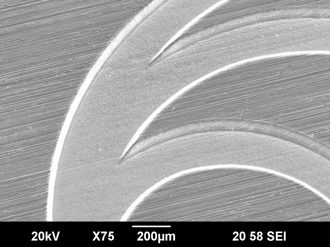 Detailed view of a micro engraving on a steel surface