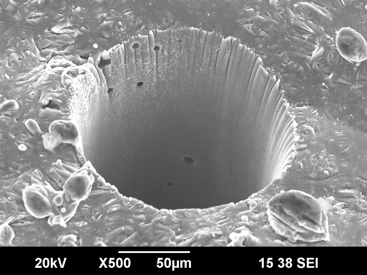 Microhole in additive manufactured aluminum