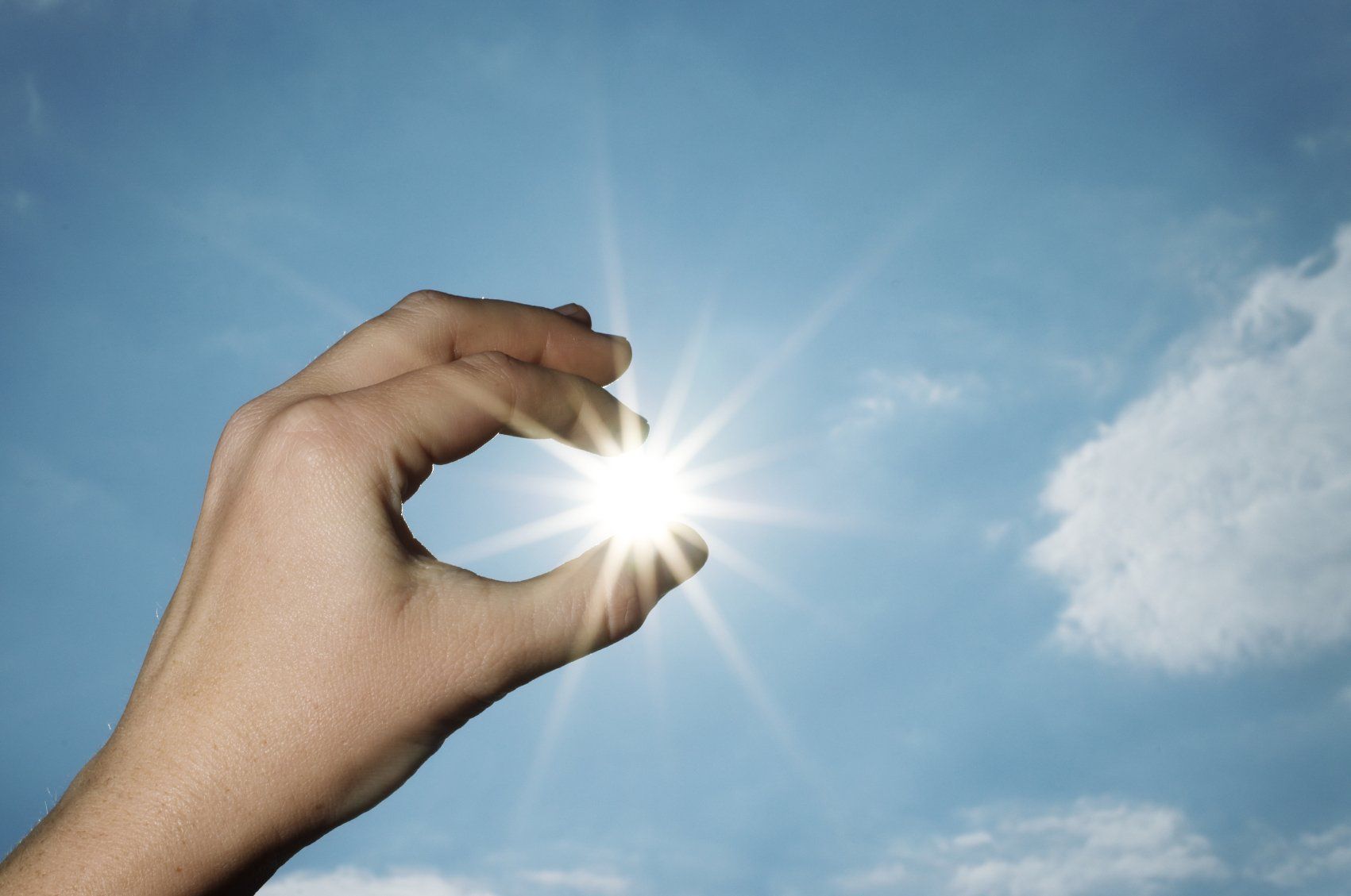 Coaching Referenzen Fulda eine Hand hält die Sonne