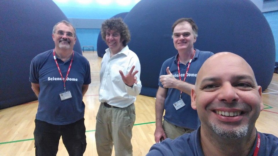 Science Dome UK presenters at a UK school hall  with planetariums set up for shows and school  science workshops.