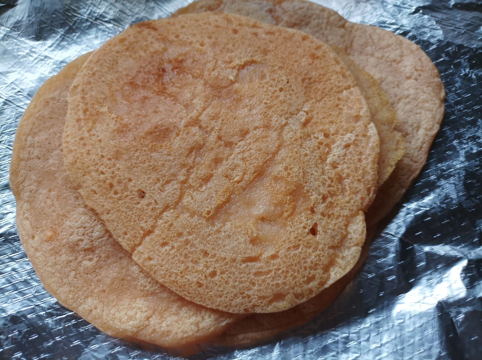 lentil wraps stacked on tin foil