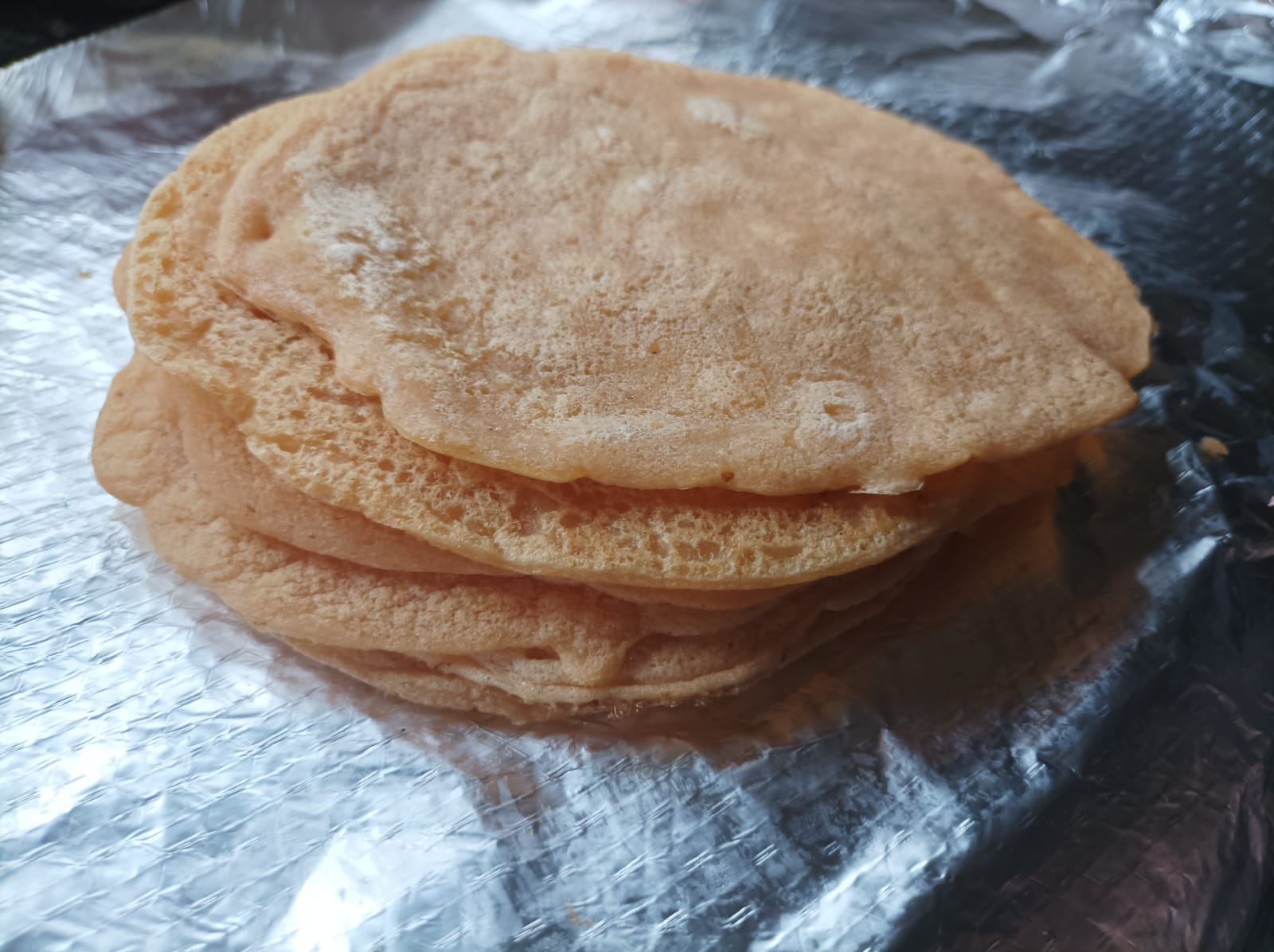 lentil wraps stacked on tin foil