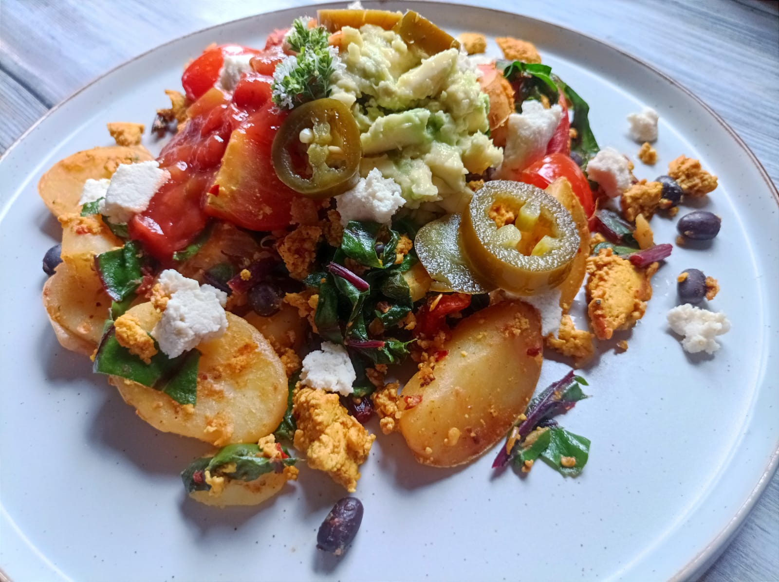 tofu hash with salsa, guac and jalapenos