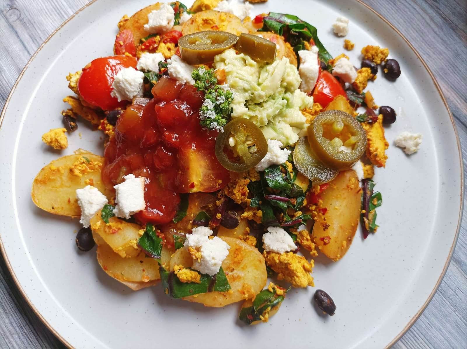 tofu hash with salsa, guac and jalapenos