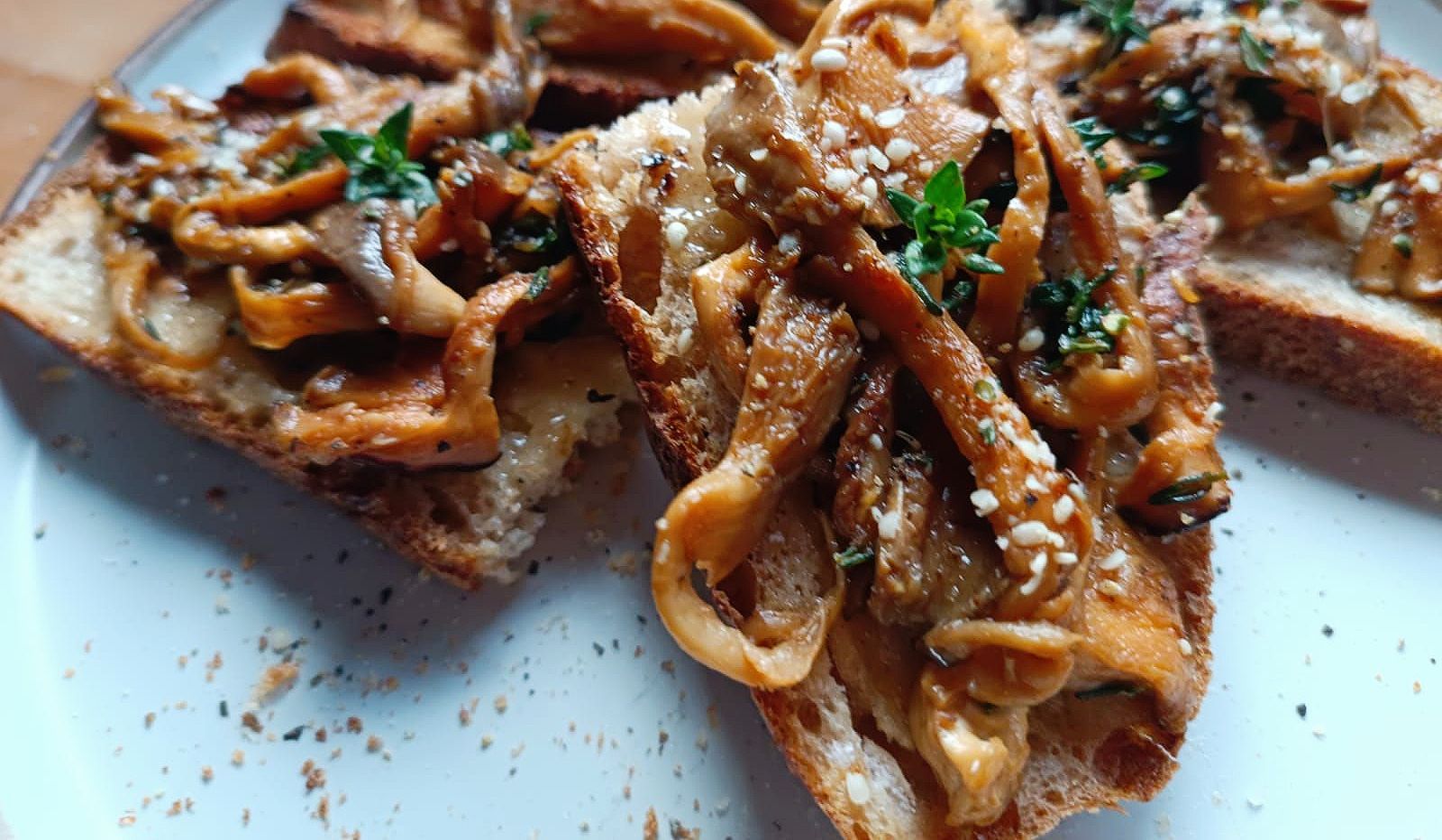 mushrooms on toast with hemp seeds and thyme