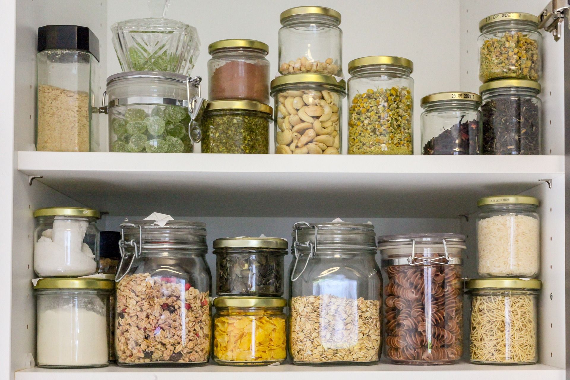 jars of food in a cupboard