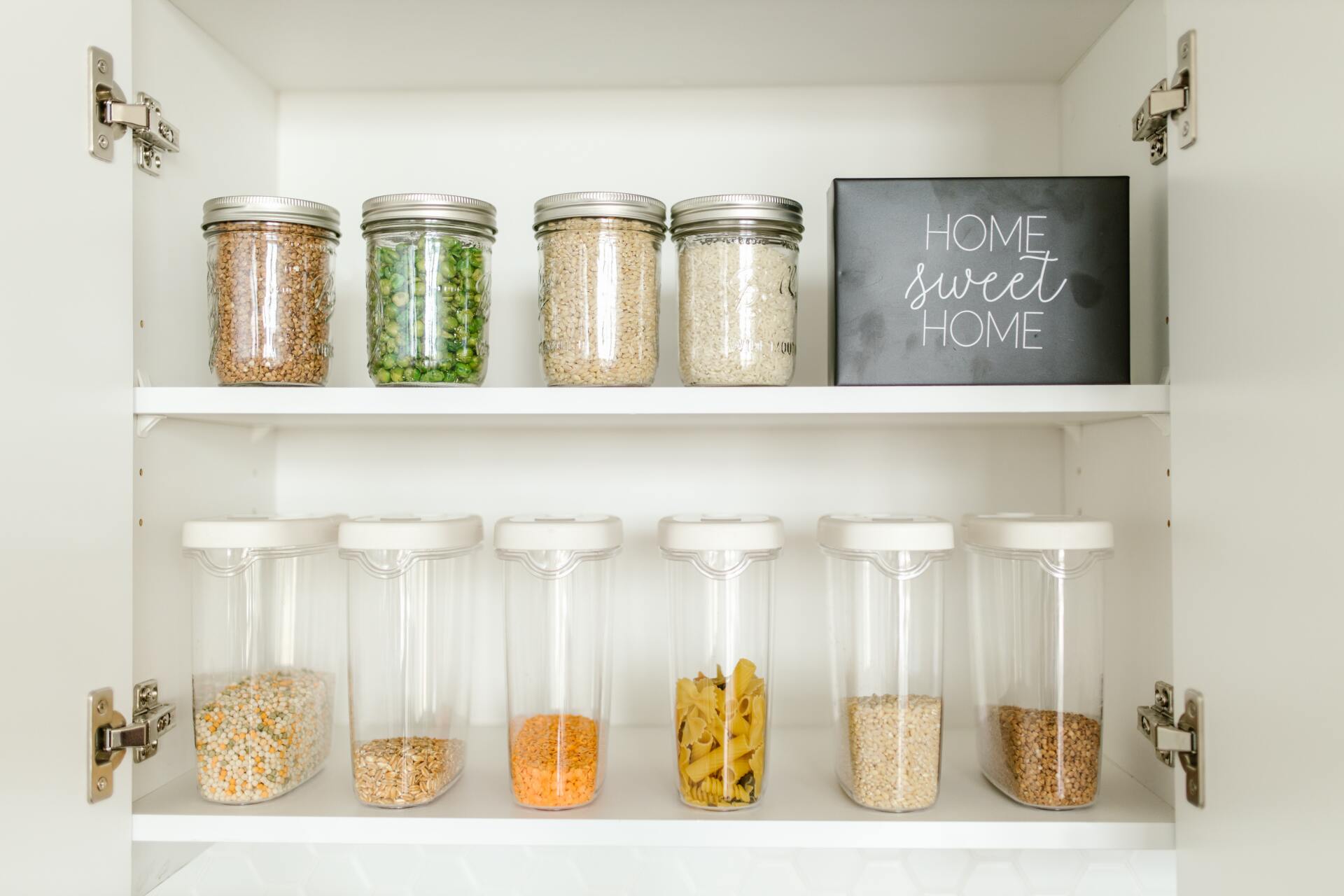 whole foods on a shelf in clear containers