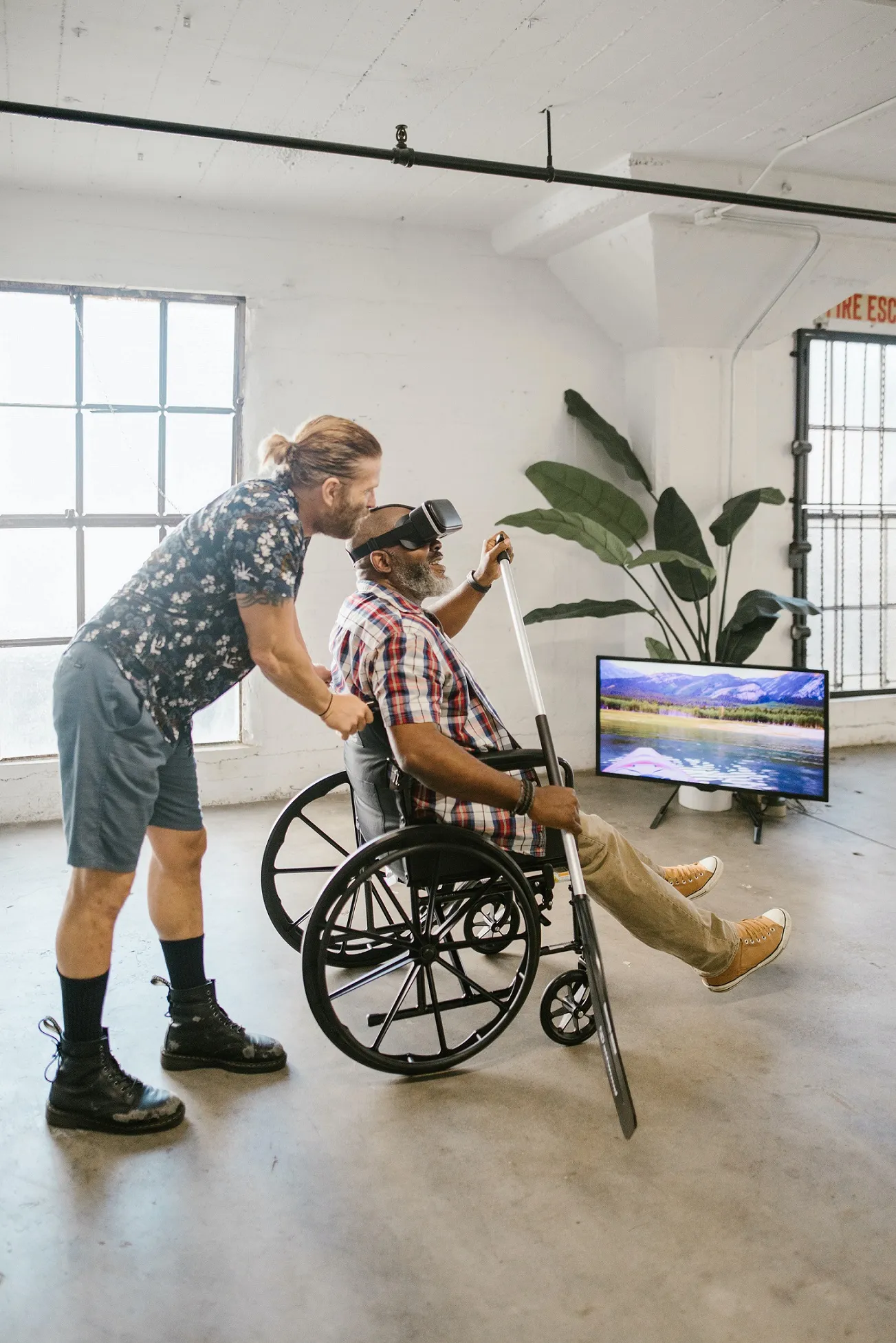 Disabled man playing with VR