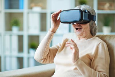 Old woman enjoying vr movies