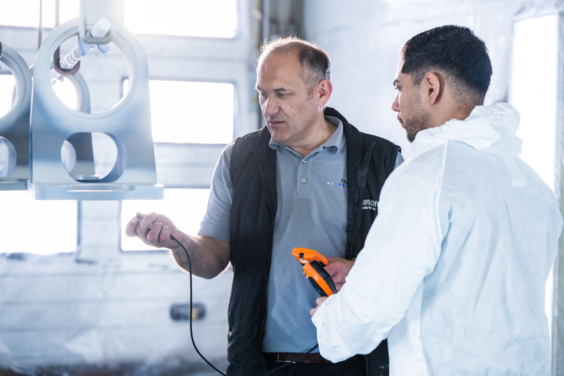 Oberflächen + Systeme GmbH, Historie