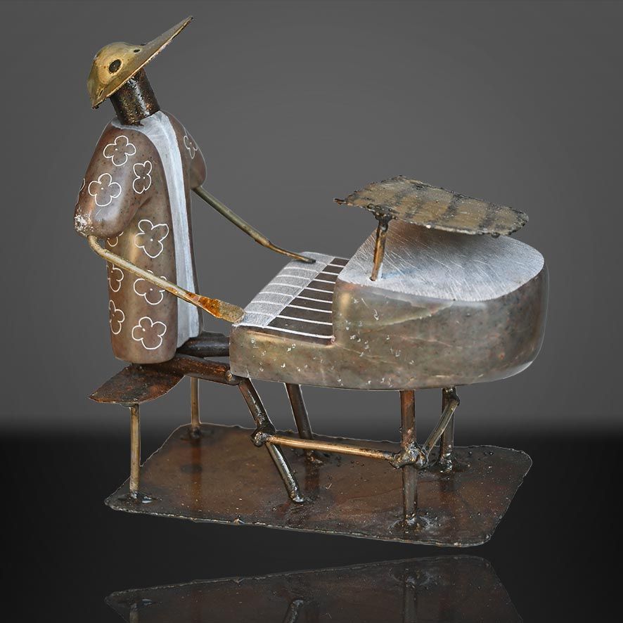 Spencer Chinake-Piano Man