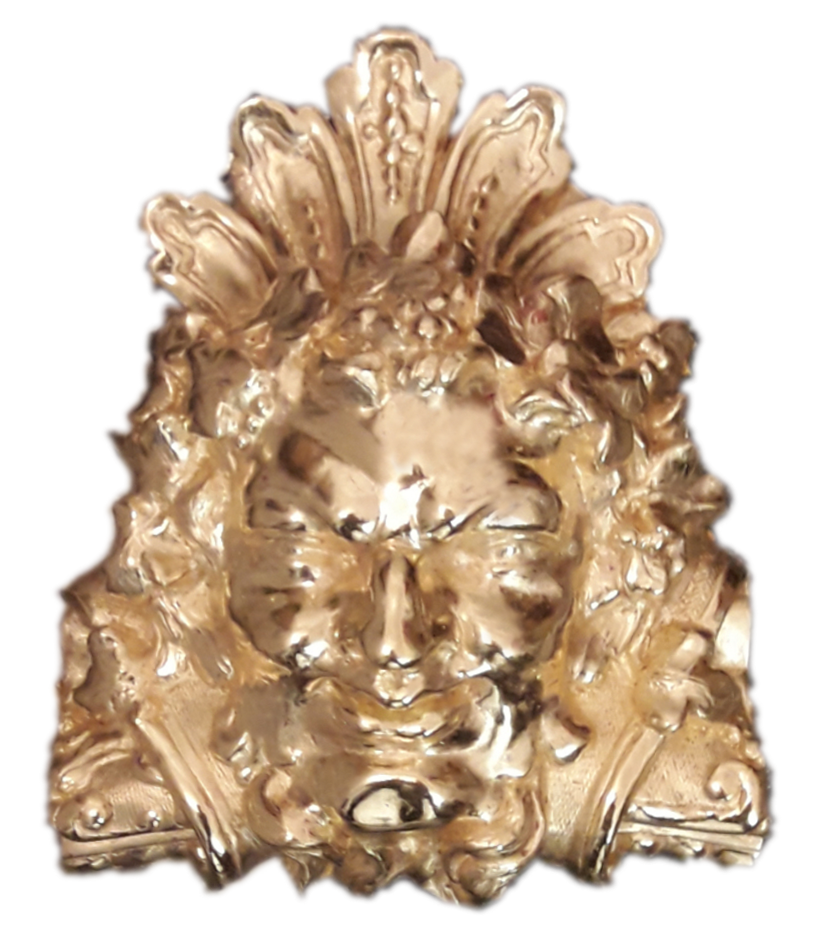 Dorure à l'eau sur un grotesque en plâtre