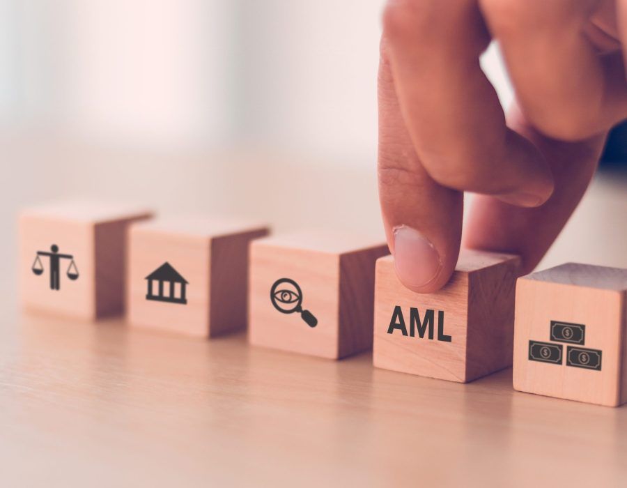 AML compliance concept for UK landlords in 2025 showing Anti-Money Laundering blocks.