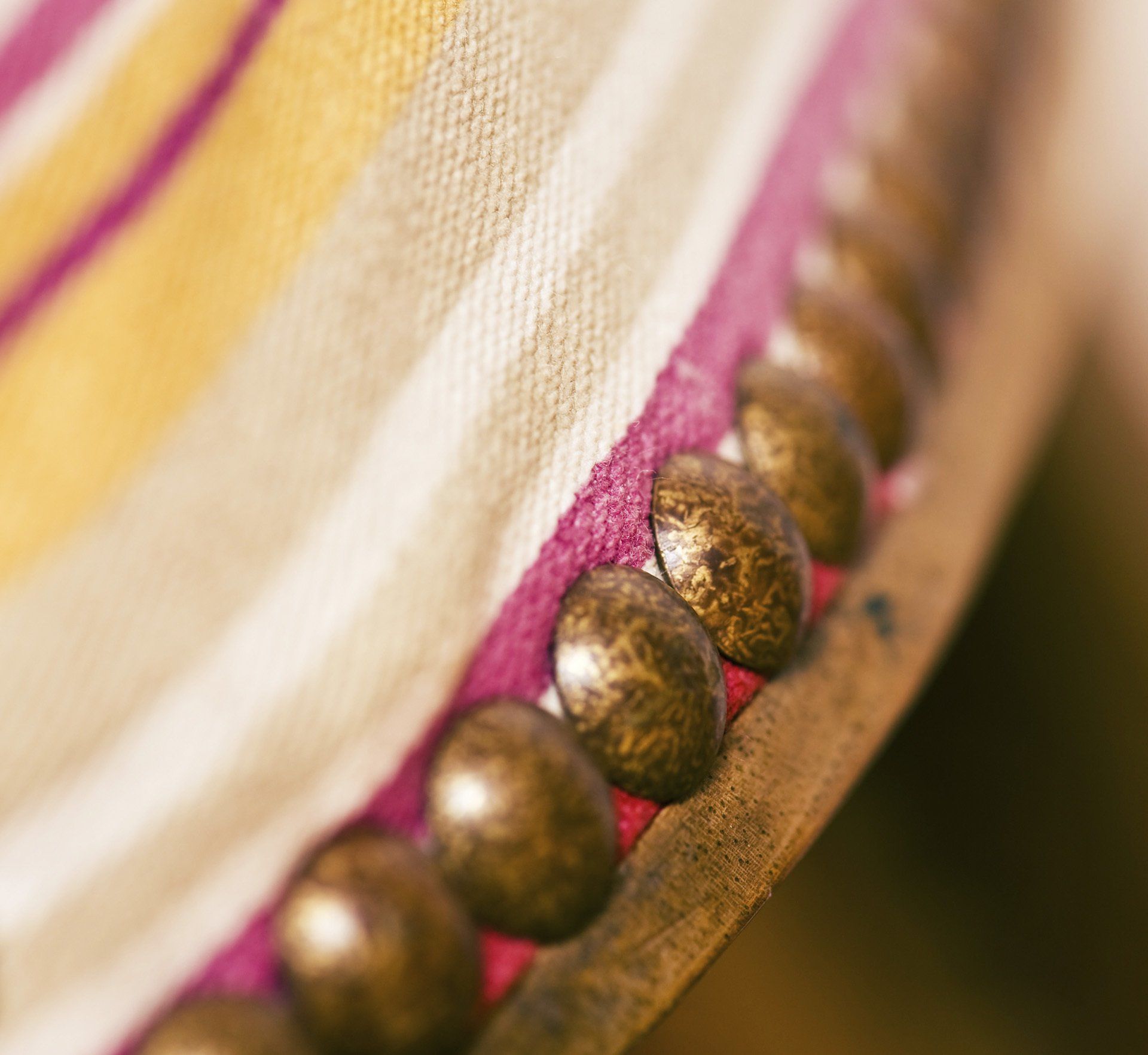 fabric on chair with close up of beading detail