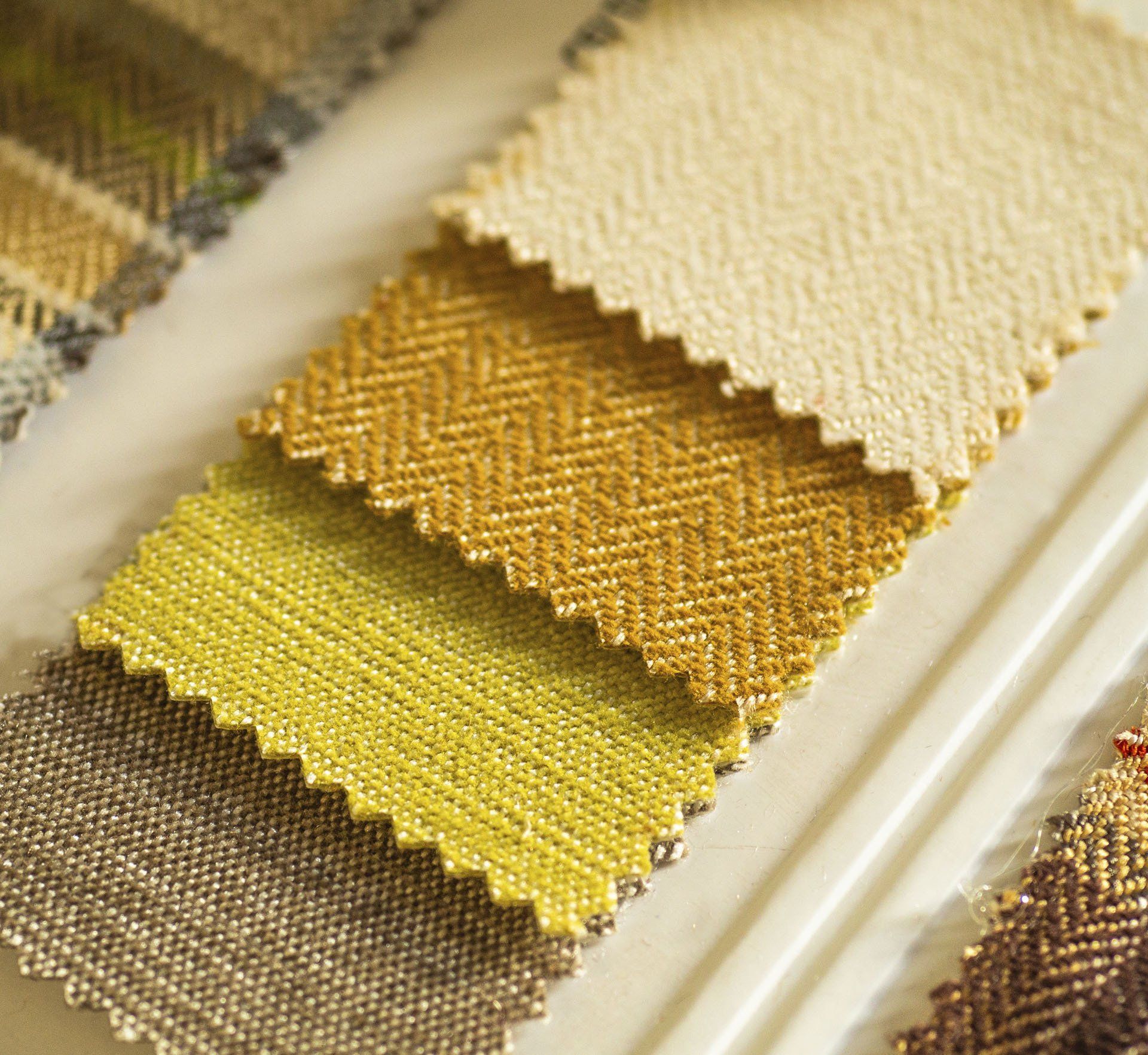 Four shades of diffrent coloured fabric samples