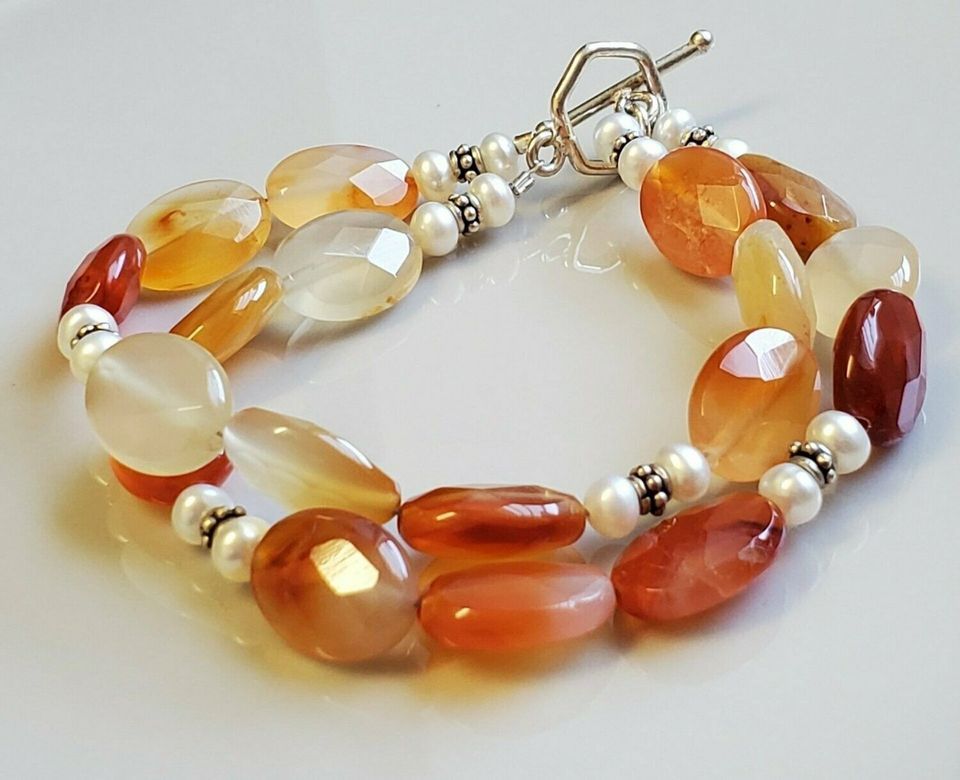 double strand bracelet featuring fire agate beads and cultured pearls